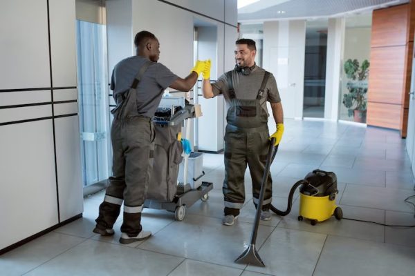 full-shot-men-high-five-office_23-2149345549